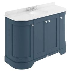 a bathroom vanity with two sinks and a cabinet in blue color, on white background