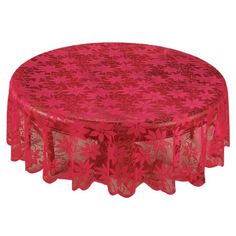 a round table covered in red and gold floral print with an intricate design on the top