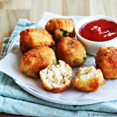 some fried food on a plate with dipping sauce