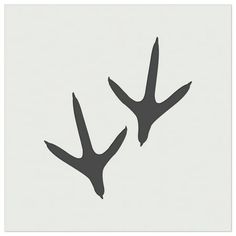 two black birds flying in the sky on a light gray and white background with text below