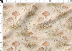 a fabric with mushrooms and flowers on it