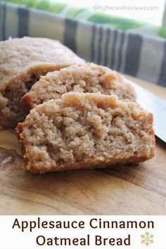 an apple cinnamon oatmeal bread is cut in half on a cutting board