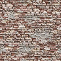 an old brick wall is shown with a red sign