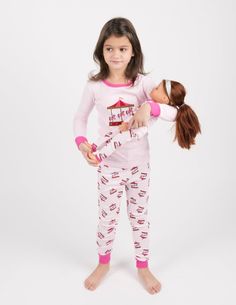 Have your little ones style effortlessly with their dolls in the Matching Girl & Doll Cotton Pajamas! Each imported set is made from soft cotton and tagless labels to protect your child’s skin from scratches. Pajamas consist of a long-sleeved shirt with pants, both with ribbed cuffs to ensure a slim fit. We offer numerous styles ranging from carousel light pink and cow red, be sure to find an outfit perfect for your child. Products include a miniature set for dolls 18 inches in length, allowing