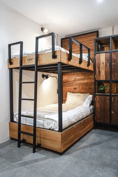 a bunk bed with two sets of ladders