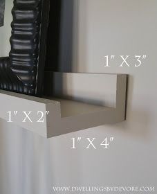 the shelf is made out of wood and has two brackets on each side, along with one