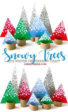 paper christmas trees made out of wood sticks and colored dots on the top, sitting in front of a white background