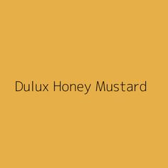 the words dulux honey mustard on a yellow background