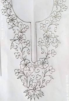 a drawing of a cross with flowers and vines on it's side, in the shape of a heart