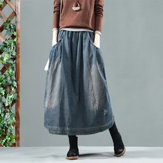 Type: Skirt
	Fabric: Denim Cotton
	Style: Casual, Loose
	Popular Elements: Stitching, Solid Color
	Season: Spring, Autumn
	Size Chart
	
	
		
			
			
			
			
			
			
			
		
		
			
				SIZE
				LENGTH
				WAIST
				HIPS
			
			
				 
				cm
				inch
				cm
				inch
				cm
				inch
			
			
				one size
				79
				31.10 

				64-88
				25.20-34.65
				126
				49.61 

			
		
	
	
	PS:Due To The Different Measurement Methods And Clothing Shrinkage, There May Be 1-4cm Error.