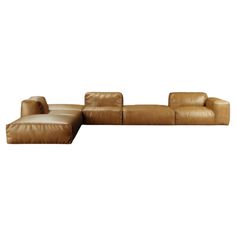 a brown leather couch sitting on top of a white floor