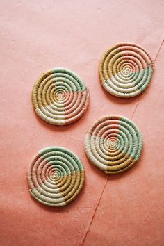 pastel woven pinwheel coasters Pastel Coasters, Woven Coaster, Woven Vase, Pastel Home Decor, Whimsical Wall Art, Pastel House, Fabric Coasters, Woven Placemats, Printed Napkins