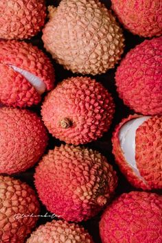 a pile of red and yellow fruit sitting on top of each other