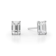 Elevate all your favorite looks with ease when you add these sophisticated emerald-cut diamond solitaire stud earrings in white gold. Created in 14K white gold Each earring showcases a 1/4 ct. emerald-cut diamond solitaire. Captivating with 1/2 ct. t.w. of diamonds These post earrings secure comfortably with friction backs. Modern White Gold Emerald Cut Earrings, Modern Emerald Cut White Gold Earrings, Emerald Cut Earrings Studs, Timeless White Gold Emerald Cut Earrings, Timeless Emerald Cut White Gold Earrings, Classic White Baguette Cut Diamond Earrings, White Emerald Cut Diamond Earrings, Emerald Cut White Lab Grown Diamond Earrings, White Emerald Cut Lab Grown Diamond Earrings