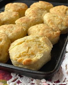 some biscuits are sitting in a pan on a table