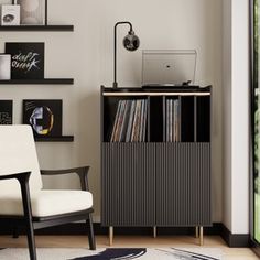 a room with a record player and a white chair in front of it, next to a window