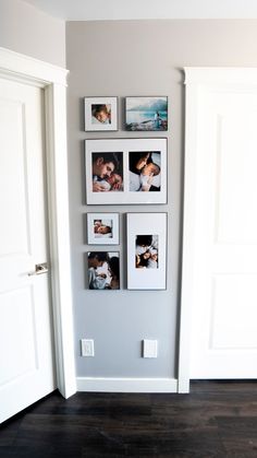 a wall with pictures hanging on it in a room next to two doors and a white door