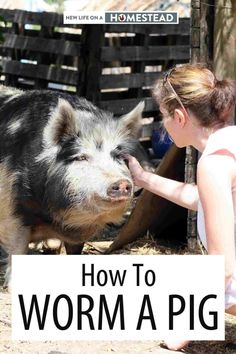 a woman petting a pig with the words how to worm a pig