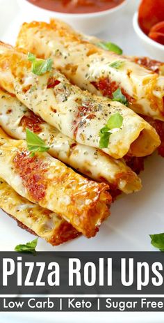 pizza roll ups on a plate with sauces and ketchup