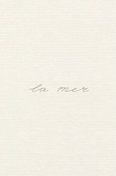 the word be me is written in cursive handwriting on a white paper background