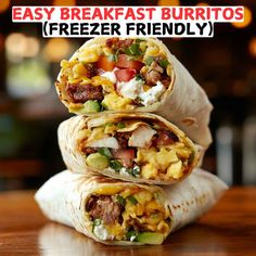 two burritos stacked on top of each other with the words easy breakfast burritos freeze friendly