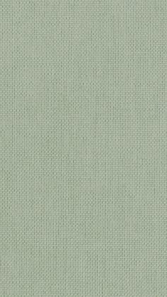 a light green background with small white dots