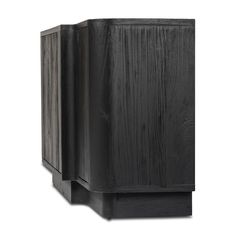 a black wooden cabinet sitting on top of a white floor