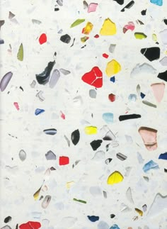 an abstract painting with many different colors and shapes on white paper that has broken glass shards all over it