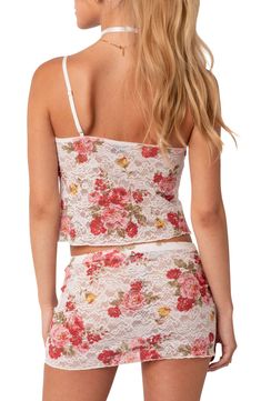 A romantic floral print adorns this sheer lace camisole crafted with a tie at the bust that highlights a delicate keyhole cutout. V-neck Adjustable straps 95% polyester, 5% spandex Hand wash, dry flat Imported Spring Lace Cami Top, Spring Delicate Lace Camisole Top, Spring Lace Camisole Top, Delicate Lace Tank Top For Spring, Spring Lace Tank Top With Built-in Bra, Lace Floral Print Sleeveless Camisole, Floral Lace Sleeveless Camisole, Lace Spaghetti Strap Top With Floral Print, Sleeveless Lace Top With Floral Print