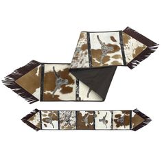 two brown and white cowhide rugs with black fringes on them, one has a giraffe design