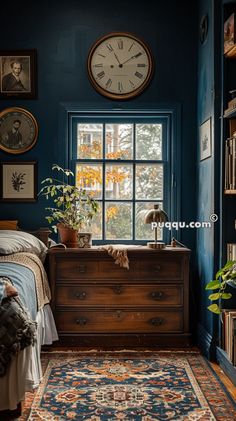 a bedroom with blue walls and a large clock on the wall next to a bed