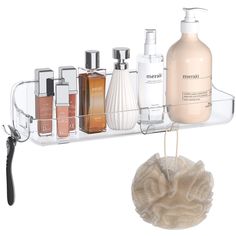 the shelf is holding several different types of skin care products and hairdrying items