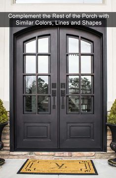 the front door is painted black and has two sidelights on each side with glass panels