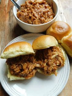 two pulled pork sandwiches and a bowl of chili