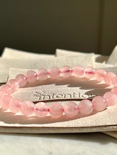 Rose Quartz Crystal Bracelet, Love Crystal, Gemstone Jewelry, Healing Crystal Gift for Her, Friendship Bracelet, Christmas Gift for Women 💕Product Description💕 Each bead is a touchstone for courage, confidence, and clarity. Handmade with love in the USA, this bracelet is more than just jewelry; it's a daily reminder of your inner strength. Size: 8mm (one size fits all) Benefit: to enhance courage and self-confidence By wearing this crystal bracelet: to love yourself - Love, Radiance, and Seren Elegant Rose Quartz Crystal Bracelet Gift, Elegant Rose Quartz Crystal Bracelet, Pink Rose Quartz Crystal Bracelet For Gift, Elegant Hand-strung Rose Quartz Crystal Bracelet, Hand-strung Rose Quartz Crystal Bracelet Gift, Rose Quartz Bracelet, Rose Quartz Crystal, Christmas Gifts For Women, Crystal Gifts