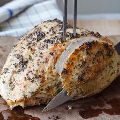 a piece of meat being cut with a knife