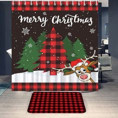 a christmas themed shower curtain with a reindeer and tree on it's side, in the middle of a living room