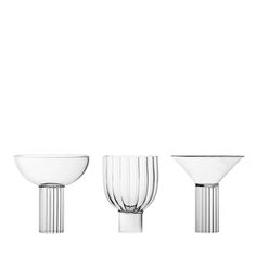 three glass bowls and one bowl on a white background