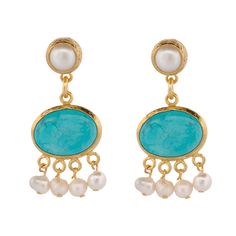 Cleopatra Pearl & Turquoise Stone Tassel Earrings are a majestic fusion of elegance and striking beauty. The earrings are expertly crafted from brass and feature a luxurious 24k gold plating that adds a radiant warmth to the design.  Each earring showcases a harmonious blend of delicate pearls and vibrant turquoise stones, arranged to create an eye-catching tassel effect. The pearls provide a touch of classic refinement, while the bold turquoise stones inject a pop of color and exotic charm.  Th Striking Beauty, June Birthstone Jewelry, July Birthstone Jewelry, August Birthstone Jewelry, White Turquoise, Pearl Jewellery Earrings, Jewelry Ring Box, Turquoise Stones, Pearl Gemstone