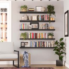 a living room filled with furniture and bookshelves