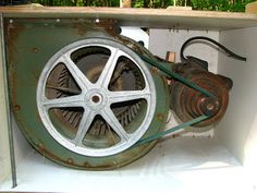 an old machine that has been turned into a power source and is sitting in a cabinet