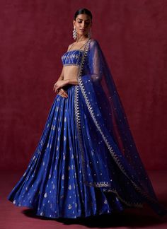 Royal Blue Embroidered Brocade Lehenga – Lashkaraa Designer Blue Banarasi Silk Sets, Reception Brocade Lehenga With Sheer Dupatta, Reception Lehenga With Sheer Dupatta In Brocade, Brocade Lehenga With Sheer Dupatta For Reception, Brocade Lehenga With Sheer Dupatta For Navratri, Festive Blue Tissue Silk Anarkali Set, Navratri Brocade Lehenga With Sheer Dupatta, Blue Tissue Silk Saree Set, Fitted Blue Tissue Silk Choli