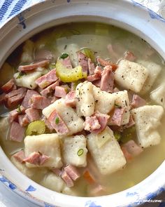 a bowl filled with ham and potato soup