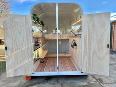 the inside of a trailer with its door open