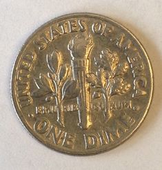 an image of a coin with the words united states of america on it's side