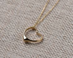 This Open Heart Necklace and chain are 14k Solid GOLD ( not filled or plated). Solid Gold Open Heart Necklace in 14k Gold, Rose Gold, White Gold. #openheartnecklace #HeartNecklace #HeartPendant #HeartCharm #zirconnecklace #heartzircon #womannecklace #goldjewelry #solidgoldnecklace #necklaceforwomen #goldpendant #romanticgifts #giftforher #goldjewelrygift #christmasgift #valentinesdaygift #romanticgifts #giftsforbestfriend #etsyjewelry #mothergift #birthdaygift Yellow Gold Heart Necklace As Gift For Her, Gold Plated Open Heart Necklace For Mother's Day, Gold Heart Necklace For Anniversary, Mother's Day Gold Plated Open Heart Necklace, Mother's Day Open Heart Gold Plated Necklace, Gold Heart Necklace For Mother's Day, Gold Sterling Silver Open Heart Necklace, Gold Heart Cut Necklace For Mother's Day, Gold Open Heart Necklace For Valentine's Day