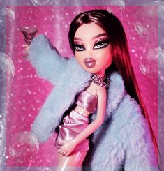 a close up of a barbie doll wearing a silver dress and fur coat with bubbles in the background