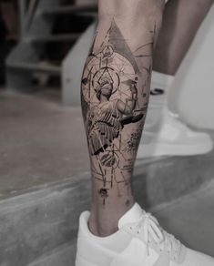 a person with a tattoo on their leg