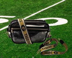 Show your GramFam love with our new deluxe, zippered clear stadium bag and custom adjustable crossbody strap. It is part of our I Am Grambling collection by LEX Gear.   This elegant clear purse is the perfect fashion forward accessory for game day, concerts, festivals, weddings, graduations, work...every day. It is made from high quality soft 3 mm pvc and is much more durable than other bags made of thin materials in the marketplace. The size of the bag is  10 x 6 x 3.25 inches and is perfect to Bayou Classic, Clear Stadium Bag, Stadium Bag, Clear Purses, Tiger Stripes, Clear Bags, Purse Strap, World Famous, Crossbody Strap