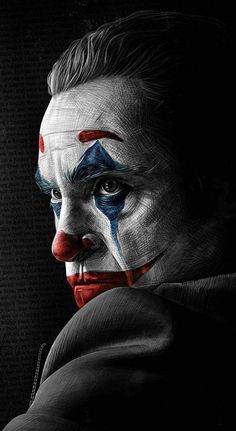 the joker with his face painted red, white and blue on it's forehead